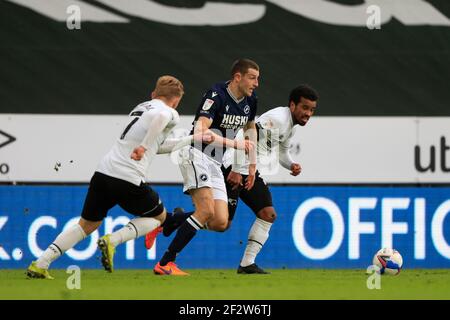 Derby, UK. 13th Mar, 2021. Murray Wallace #3 of Millwall runs with the ball in Derby, UK on 3/13/2021. (Photo by Conor Molloy/News Images/Sipa USA) Credit: Sipa USA/Alamy Live News Stock Photo