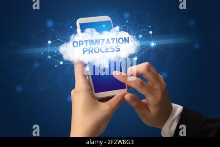 Hand using smartphone with cloud business concept Stock Photo