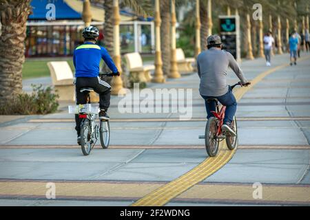 bicyclist morning ride in Al khobar corniche. AL-KHOBAR, SAUDI ARABIA. 12-March-2021. Stock Photo