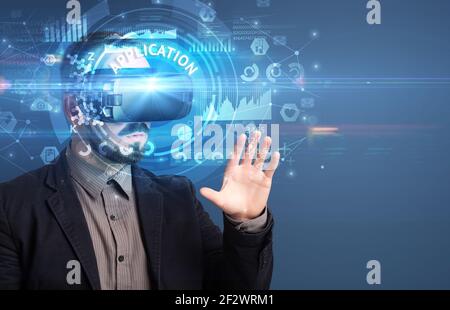 Businessman looking through VR glasses