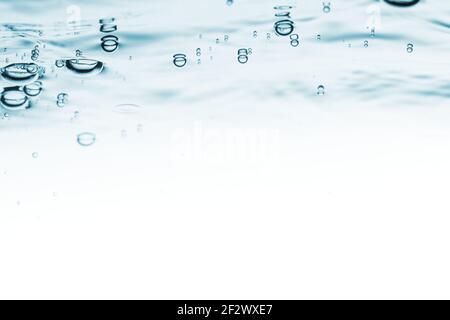 Water blue wave background. Air bubbles in clear water liquid Stock Photo
