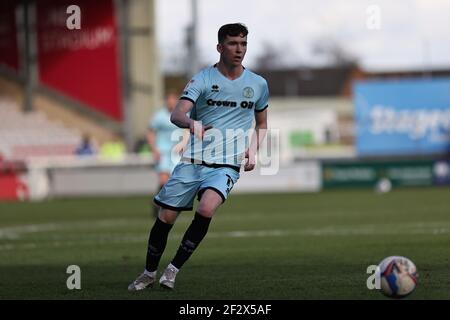 LINCOLN, UK. MARCH 13TH: Conor Grant of Rochdale in action during the Sky Bet League 1 match between Lincoln City and Rochdale at LNER Stadium, Lincoln on Saturday 13th March 2021. (Credit: James Holyoak | MI News) Credit: MI News & Sport /Alamy Live News Stock Photo