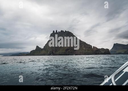 Drangarnir is the collective name for two sea stacks between the islet Tindholmur and the island Vagar in the Faroe Islands. Stock Photo