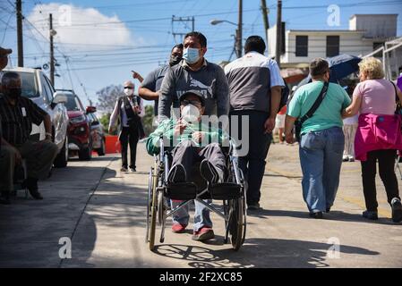 Xalapa, Mexico. March 13, 2021: Thousands of older adults received the COVID-19 vaccine in the city of Xalapa. From early on they made lines and for their application they were sanitized and did body activation exercises. Credit: Hector Adolfo Quintanar Perez/ZUMA Wire/Alamy Live News