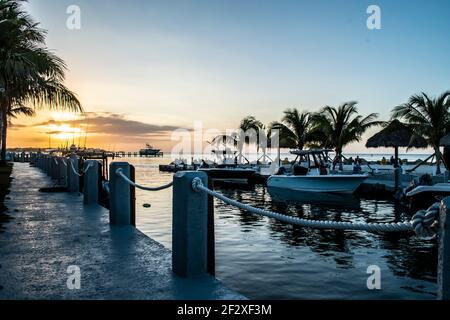 Florida Keys Sunset-Travel to the Gulf of Mexico along the Florida Coastline, enjoy the tranquility or this popular vacation beach destination Stock Photo