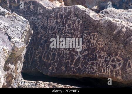 Petroglyphs can be found in several places in the Volcanic Tablelands just north of Bishop, Inyo County, CA, USA. Stock Photo