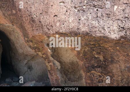 Petroglyphs can be found in several places in the Volcanic Tablelands just north of Bishop, Inyo County, CA, USA. Stock Photo