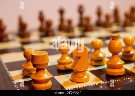 Black and white photo with a picture of a chessboard and chess pieces. Boardgame of chess pieces and set. Stock Photo