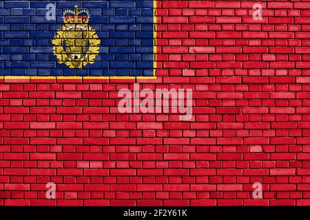 flag of Royal Canadian Mounted Police painted on brick wall Stock Photo