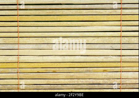 An old traditional bamboo curtains for a natural wallpaper Stock Photo