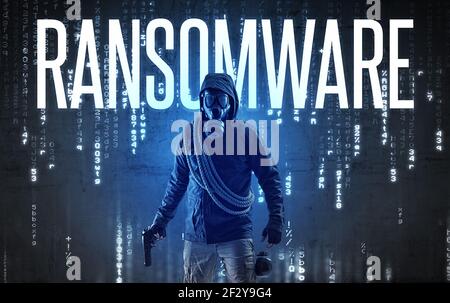 Faceless hacker with inscription Stock Photo