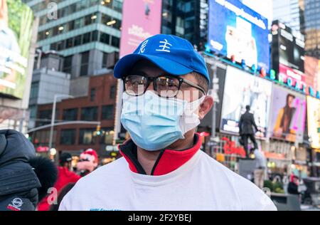 New York, NY - March 13, 2021: Members of China Democracy Party staged rally on Times Square Stock Photo