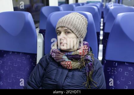 Portrait of a serious woman in a train Stock Photo