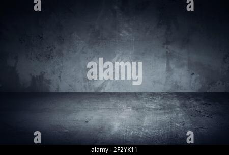 Dark room in beam of light with concrete wall and floor. Texture background image Stock Photo