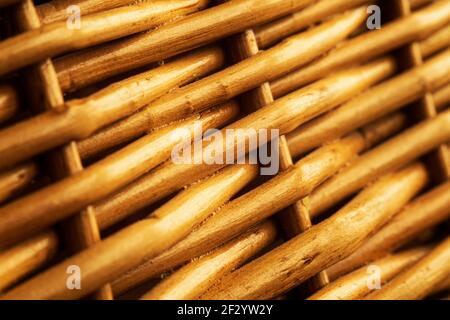 Dark orange shiny willow twigs intertwined with each other closeup Stock Photo
