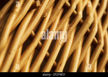 Brown willow twigs woven together with selective focus closeup Stock Photo