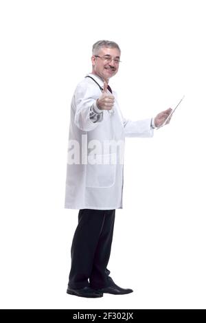 smiling doctor with a digital tablet showing a thumbs up Stock Photo