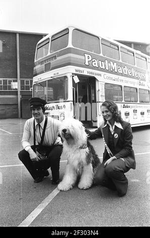 Paul Madeley of Leeds United launches his new colour centre with pals 1975 Stock Photo