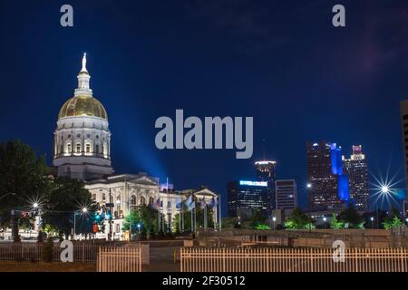 Atlanta, Ga USA - 06 14 20: Georgia State capital at night fence city skyline downtown Atlanta lights Stock Photo