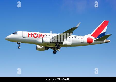 Paris, France - August 17, 2018: Hop Embraer 170 airplane at Paris Charles de Gaulles airport (CDG) in France. Stock Photo