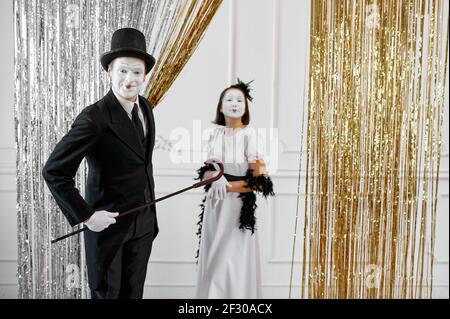 Two mime artists, lady and gentleman Stock Photo