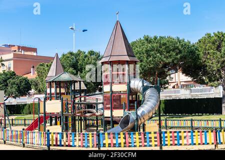 Children's play park on a sunny day. Playground over blue sky Stock Photo