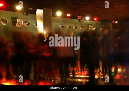 Nightclub dance crowd in motion Stock Photo