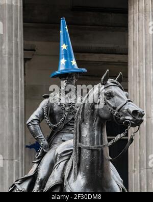 Brexit in Scotland - Duke of Wellington statue in Glasgow with brexit makeover of iconic cone on his head Stock Photo