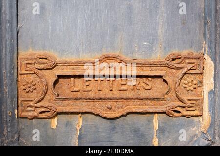 Rusty ornate letterbox with Letters wording, Quebec, Canada Stock Photo