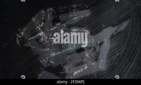 Smudged traces of colored chalk on a black board. School concept Stock Photo