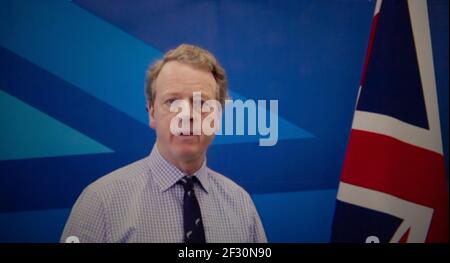 Glasgow, Scotland, UK. 14 March 2021. Pictured: Alister Jack MP Secretary of State for Scotland, seen speaking via video link from London at Scottish Conservatives National Conference (SCC21) which is online due to the pandemic. Credit: Colin Fisher/Alamy Live News Stock Photo