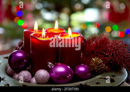 Four red candles for Advent. Christmas background. Stock Photo