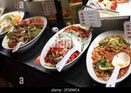 Various salads on the plates at a buffet Stock Photo