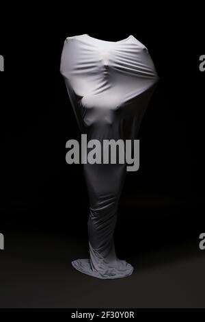 Black model covered in black body paint Stock Photo - Alamy