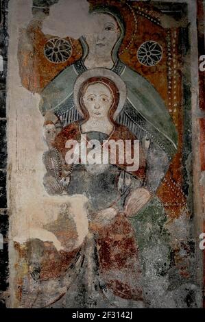 Sant'Anna Metterza (the Virgin Mary and Christ Child with Saint Anne,  mother of Mary and grandmother of Jesus). Fresco painted in the late 1300s  in the north apse of the Chiesa di