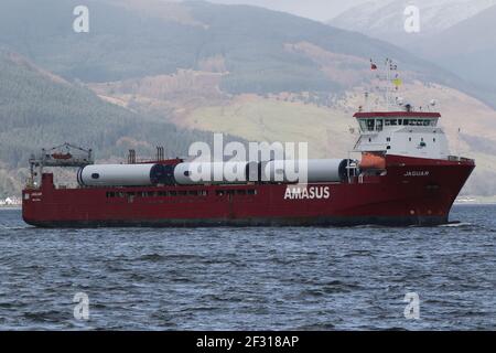 Jaguar, a general cargo vessel operated by Amasus Shipping, with a cargo of wind turbine parts, passing Kempock Point, Gourock, on the Firth of Clyde Stock Photo