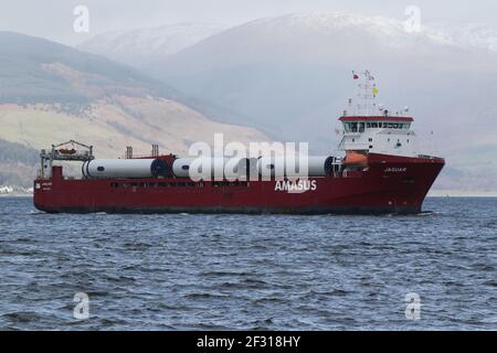 Jaguar, a general cargo vessel operated by Amasus Shipping, with a cargo of wind turbine parts, passing Kempock Point, Gourock, on the Firth of Clyde Stock Photo