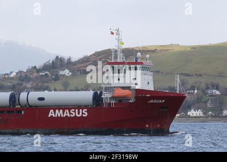 Jaguar, a general cargo vessel operated by Amasus Shipping, with a cargo of wind turbine parts, passing Kempock Point, Gourock, on the Firth of Clyde Stock Photo