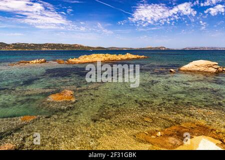 Panoramic Seascape View of the Golfo di Arzachena from Spiaggia Tre Monti Showing Clear Mediterranean Water and Islands of La Maddalena and Caprera Stock Photo