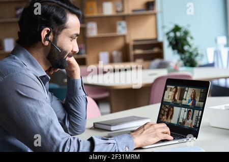 Indian business man having virtual team meeting on video conference call. Stock Photo