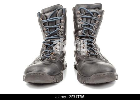 pair of black leather used clean civillian men 8-inch ankle boot, front view, isolated on white Stock Photo
