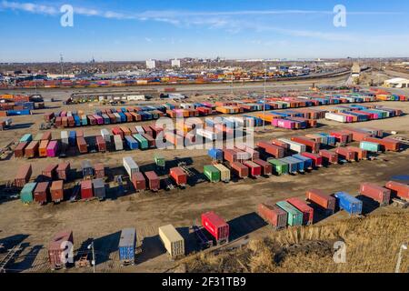 Detroit, Michigan - Shipping containers waiting to be transferred between trucks and trains at a Norfolk Southern Intermodal Terminal. Stock Photo