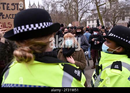 Parliament Square, London, UK. 14th Mar 2021. Protesters in Parliament Square in solidarity with Sarah Everard and violence against women. Credit: Matthew Chattle/Alamy Live News Stock Photo