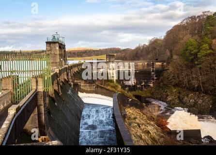 Water being released from the flood gates on Earlstound Dam, Galloway Hydro Electric Scheme, Scotland Stock Photo