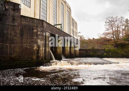 Water being released from the turbines at Kendoon Power Station on the Water of Ken, Galloway Hydro Electric Scheme, Scotland Stock Photo