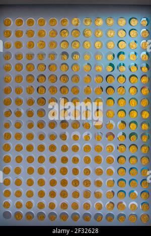 Athens, Greece, September 28, 2020: Collection of ancient coins at the Acropolis museum in Athens, Greece Stock Photo