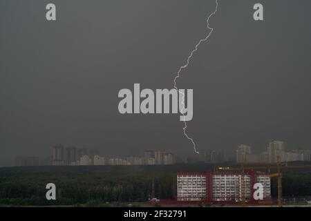 lightning over the city, city harbour at night, justice day, perfect storm Stock Photo