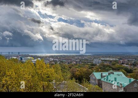 Stormy sky and city of Montreal, early Autumn, Villa Maria private school in foreground, Montreal, Qc Stock Photo