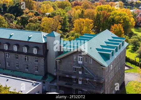 Autumn foilage and city view Western end of Montreal Island from NDG to the West Island, Villa Maria Private School in the foreground, Montreal, Qc Stock Photo