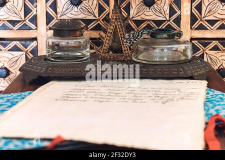 16th century manuscript and very old inkwell Stock Photo